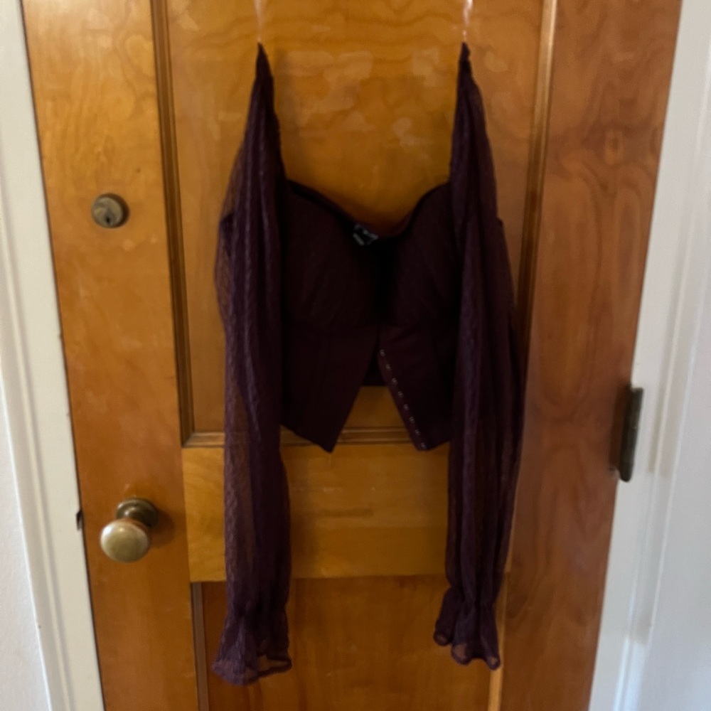 Purple corset top.